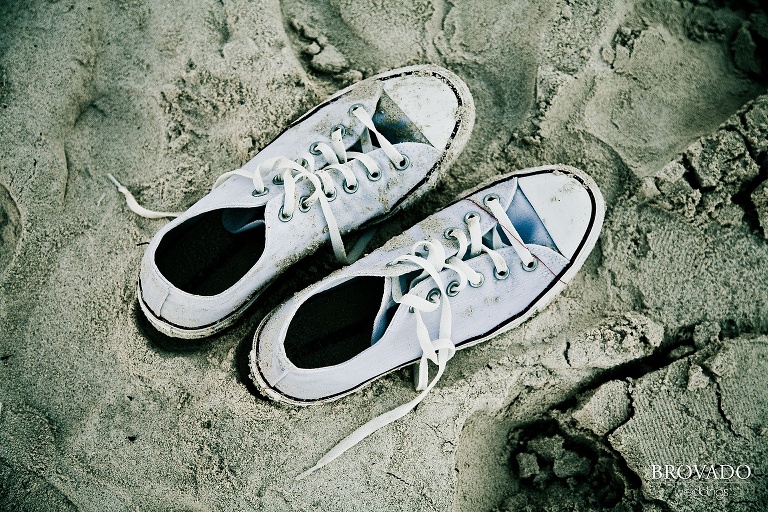 Sandy shoes on the beach