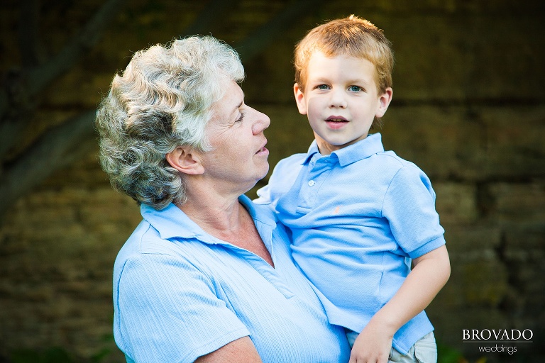 child and grandmother pose together