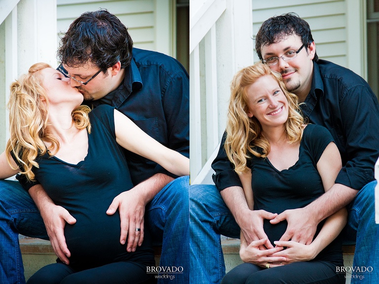 pregnant couple embraces on front porch