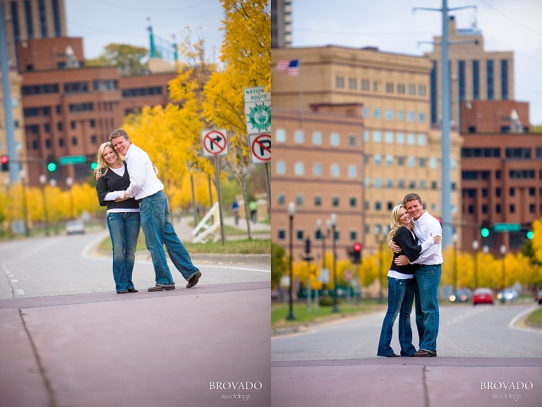 fun poses in front of the city skyline