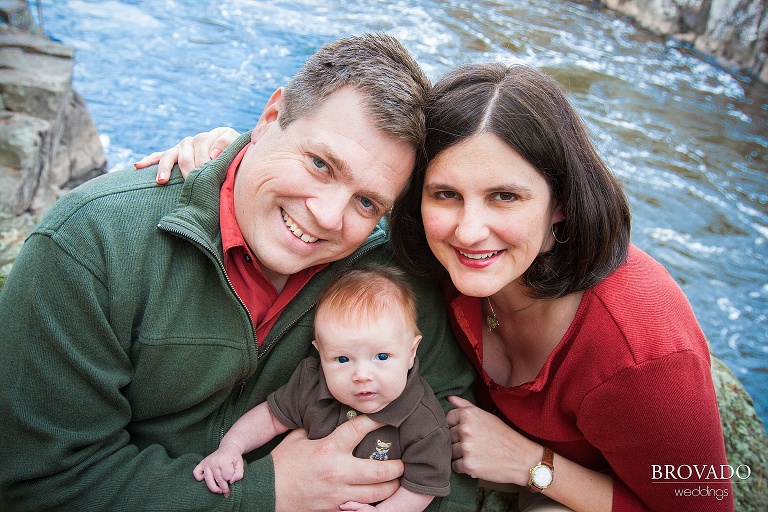 newborn family portrait overlooking the river
