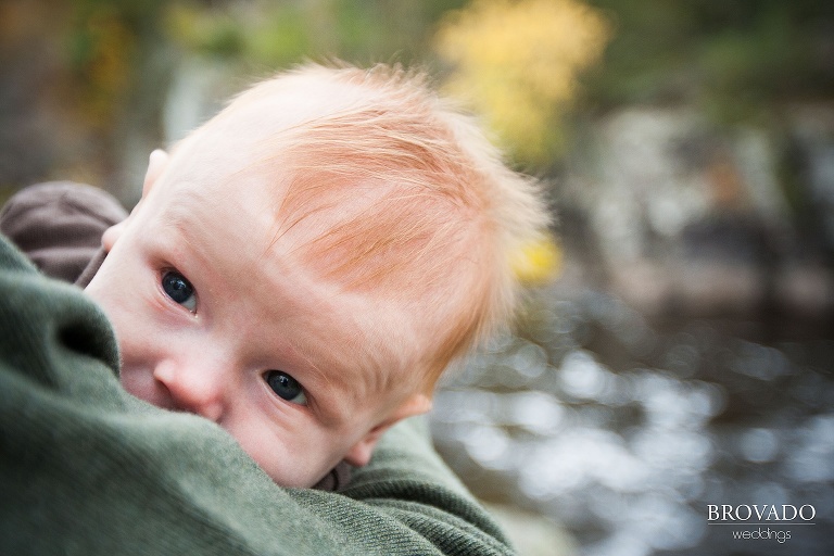 close-up detail of newborn's red hair