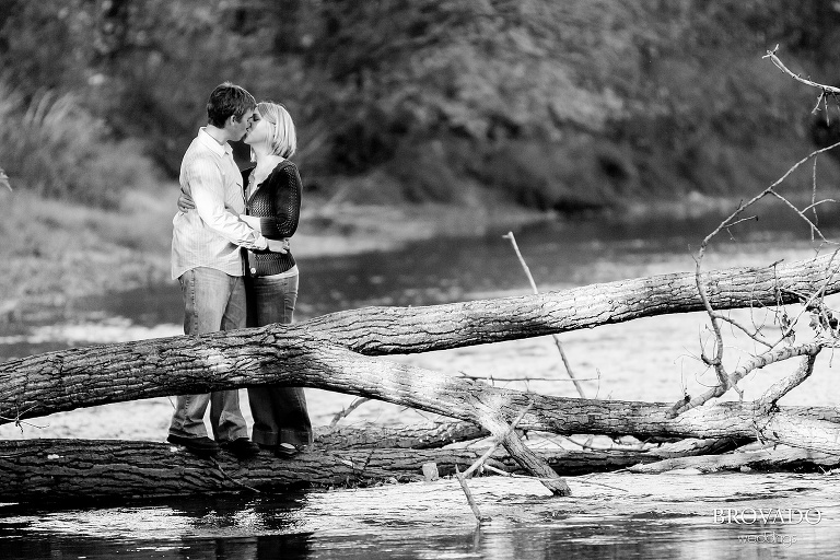 dramatic black and white kiss over the river