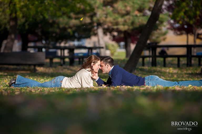 couple kiss in the fall leaves