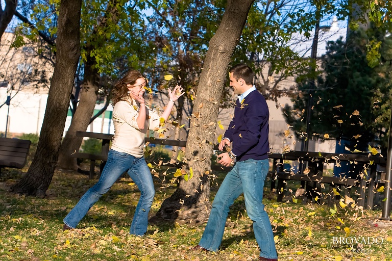 couple plays in leaves