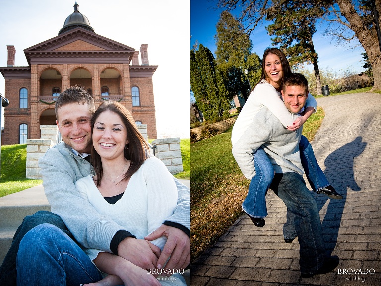 engaged couple poses and smiles