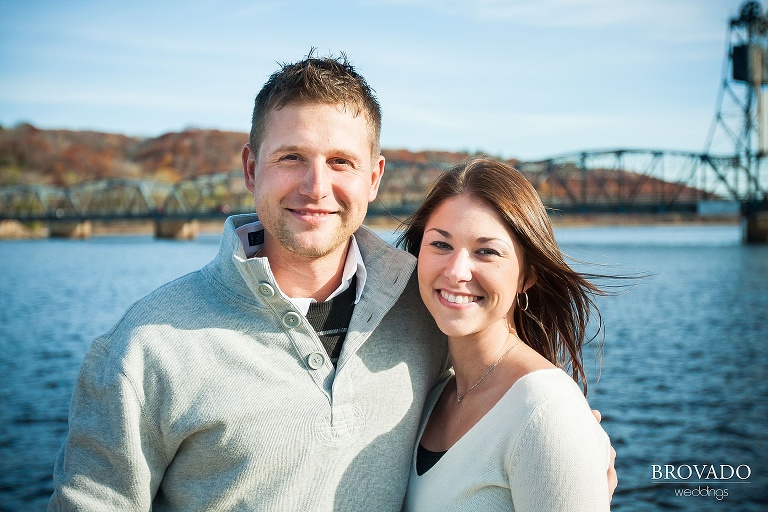 engaged couple in front of stillwater lift bridge