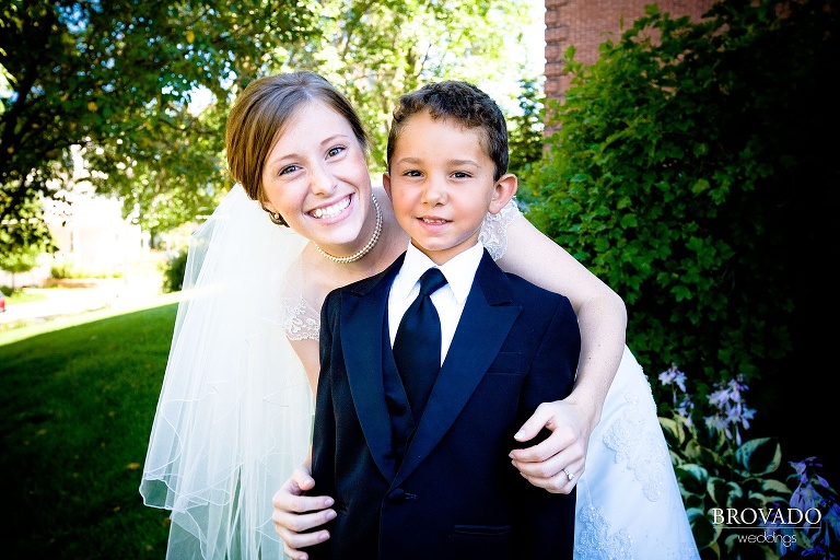 bride embracing a child