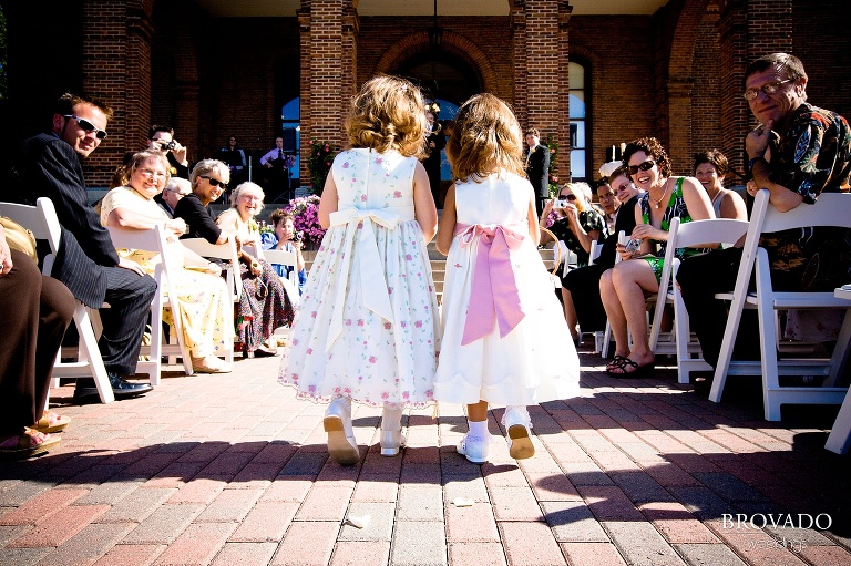 flower girls walking down the aisle