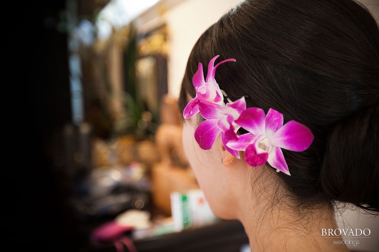 close up of flowers in bride's hair