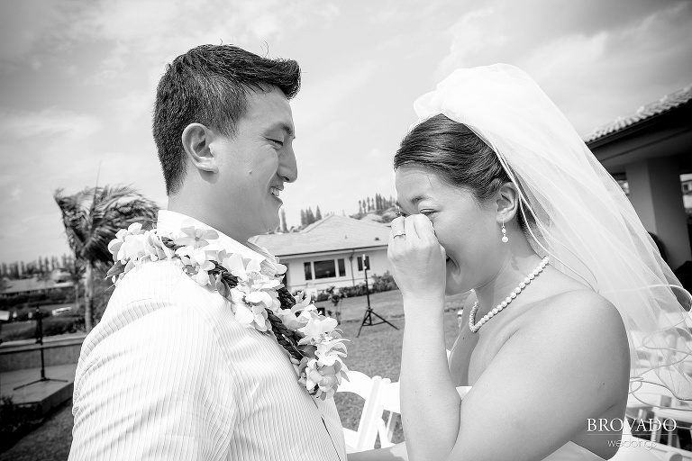 bride and groom laughing during first look