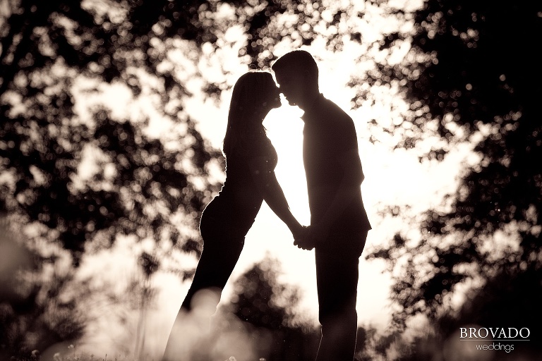 silhouette of kissing couple