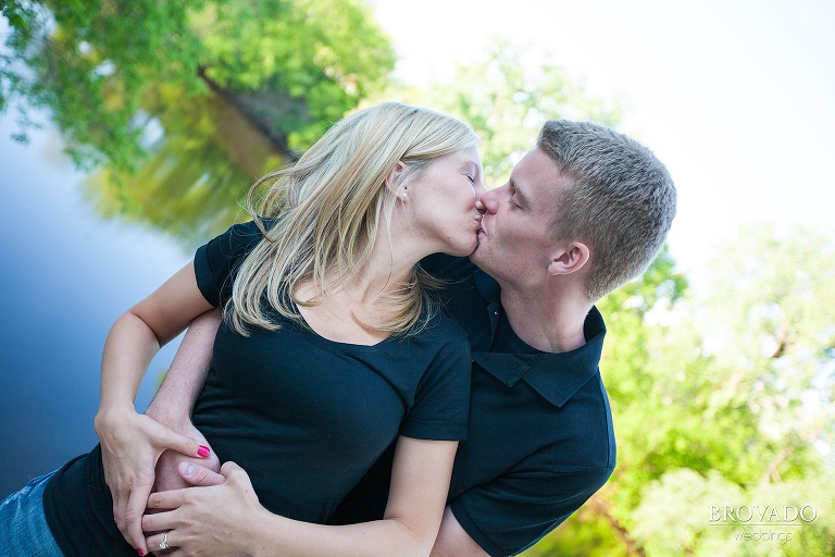 couple in matching outfits kissing