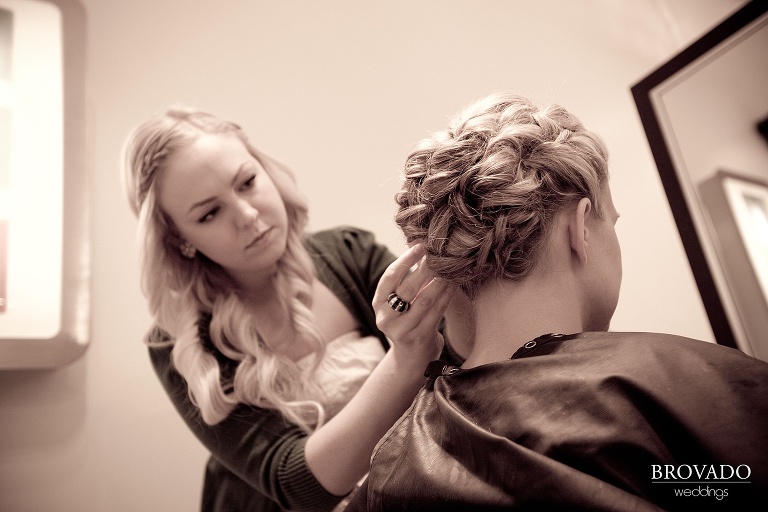 close-up wedding photography of bride getting her hair done
