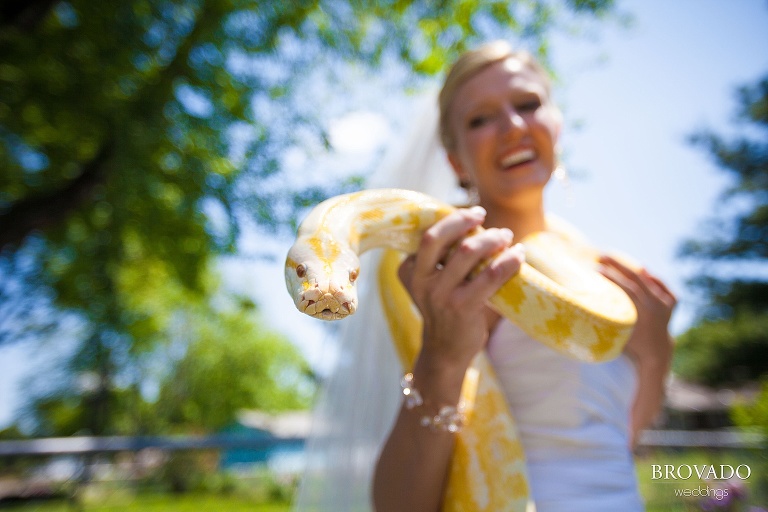 bride wearing a yellow snake around her neck
