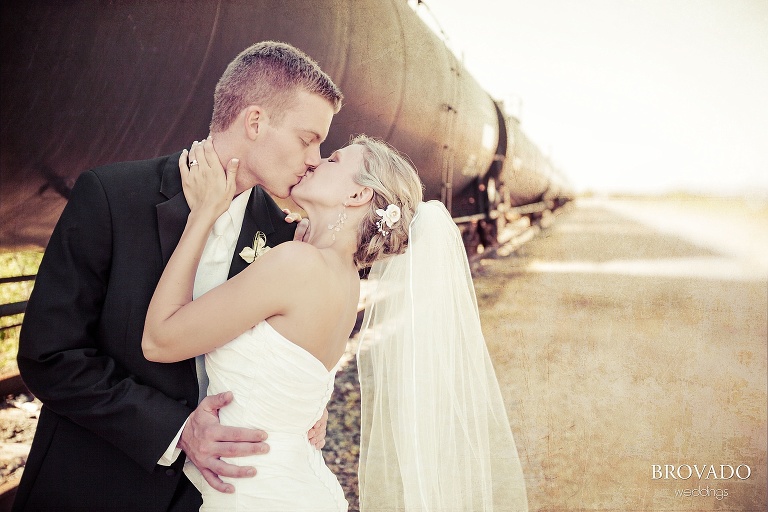 sepia wedding photography in front of a train