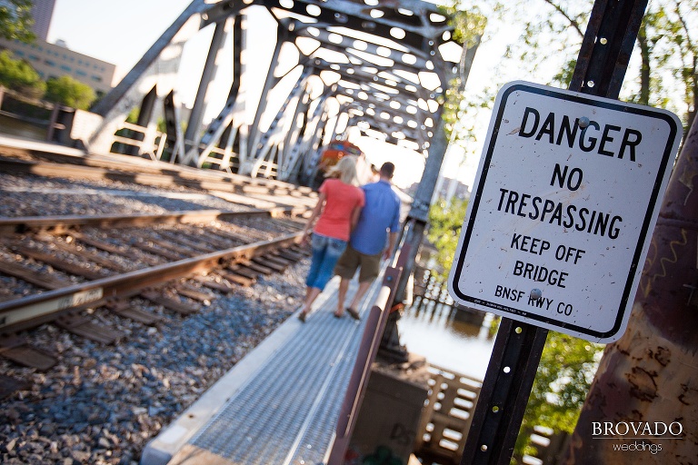 couple walking past no trespassing sign