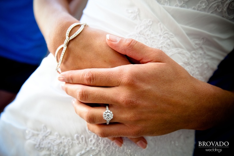 close up photograph of bride showing off her wedding ring