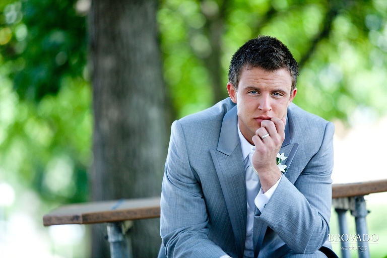 moody photograph of the groom
