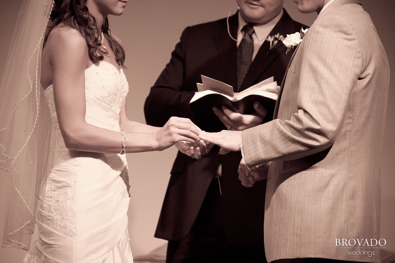 closeup of wedding ring exchange