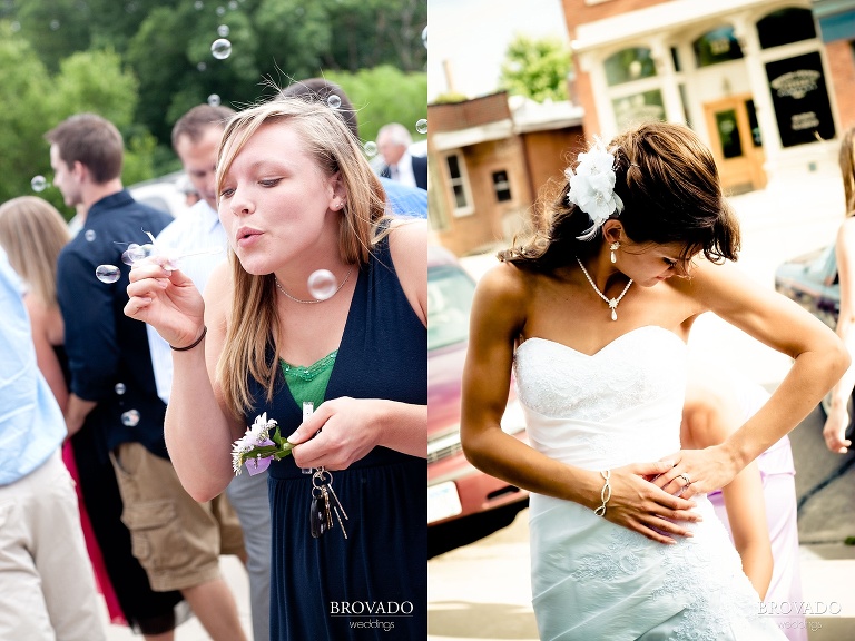 close up photograph of wedding party guest blowing bubbles