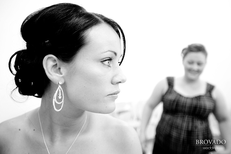 closeup black and white photograph of bride's makeup and jewelry