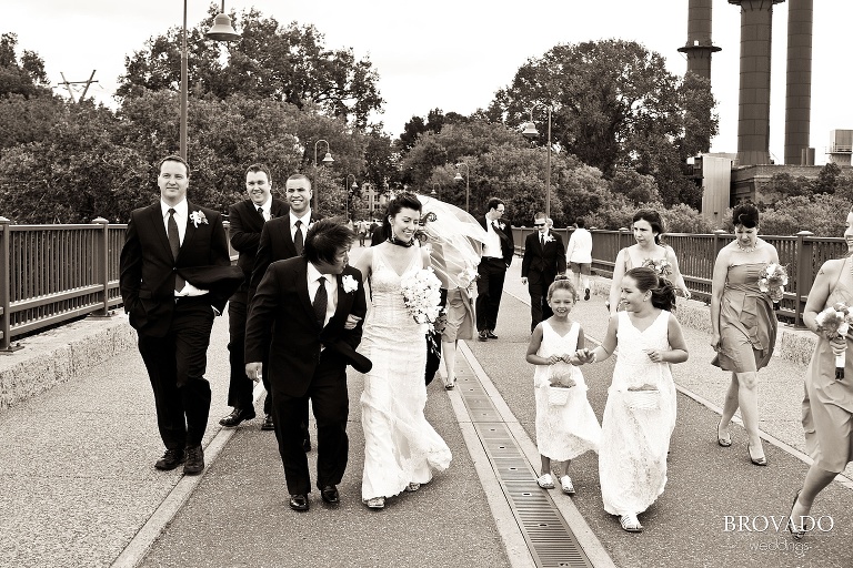 black and white wedding photography on minneapolis stone arch bridge