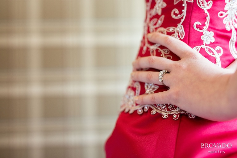 Untraditional aviation wedding with a red dress on a sunny day at the Gale Mansion in Minneapolis Minnesota