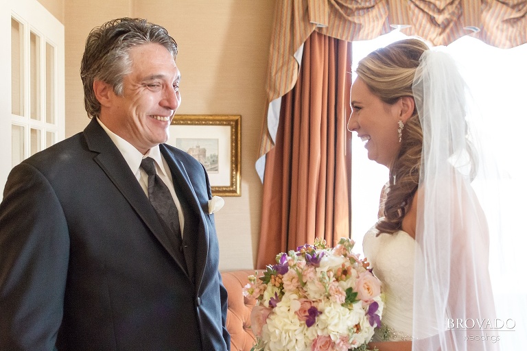 Bride and her father having their first look on her wedding day