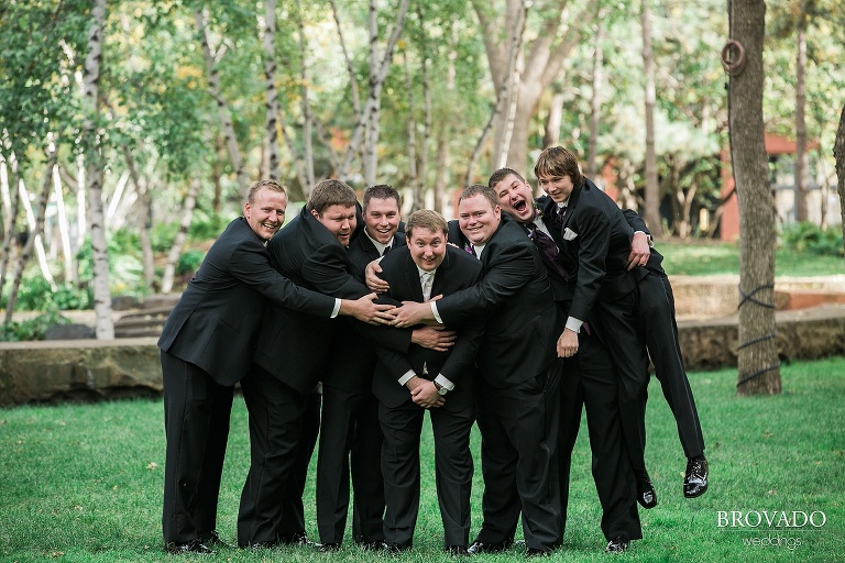 Goofy groomsmen pose