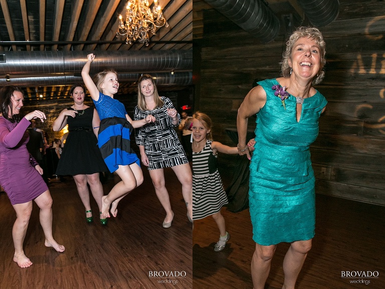 Dancing wedding party guests