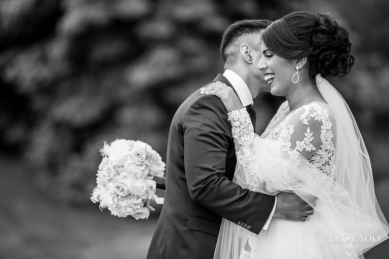 Fun black and white photo of bride and groom