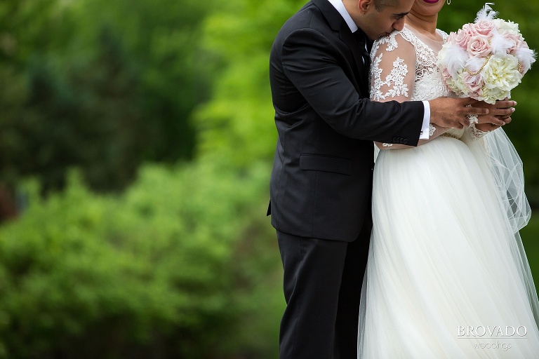 Bride and groom embrace on their wedding day