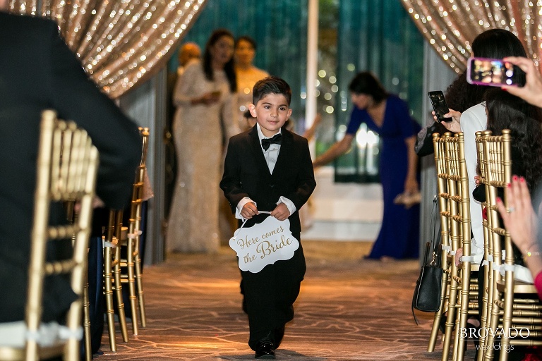 Ringbearer leads the way for bride and groom