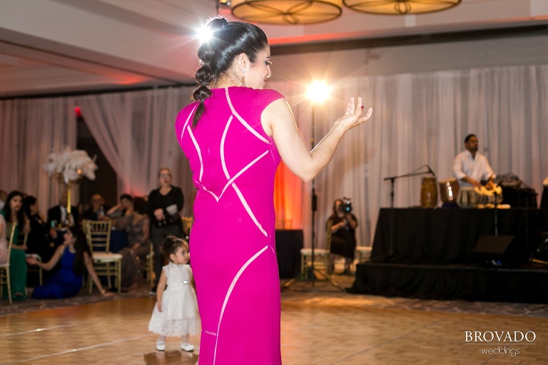 Dancing wedding reception guests