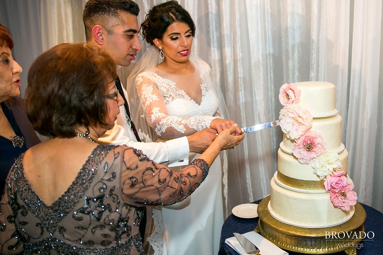 Cake cutting at wedding reception