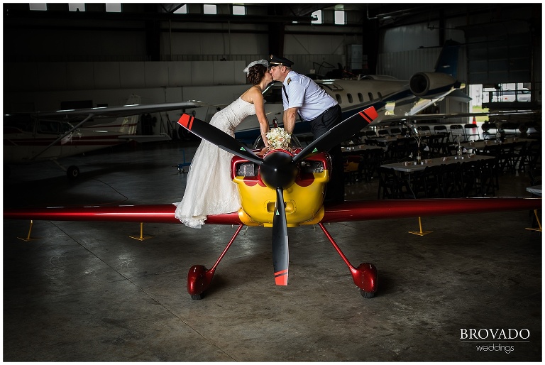 airplane themed wedding, airport, hanger, wedding photographer, pilots, themed weddings, brovado wedding 