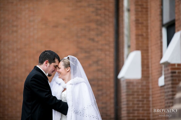 Heidi and Tony smiling outside of church
