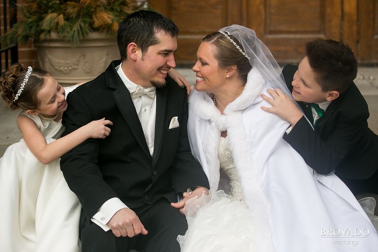 Heidi and Tony posing with their kids