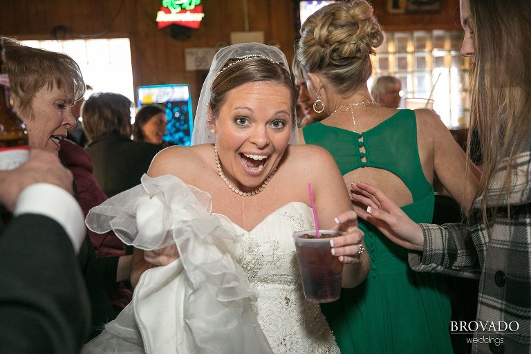 Heidi and her friends celebrating with a drink