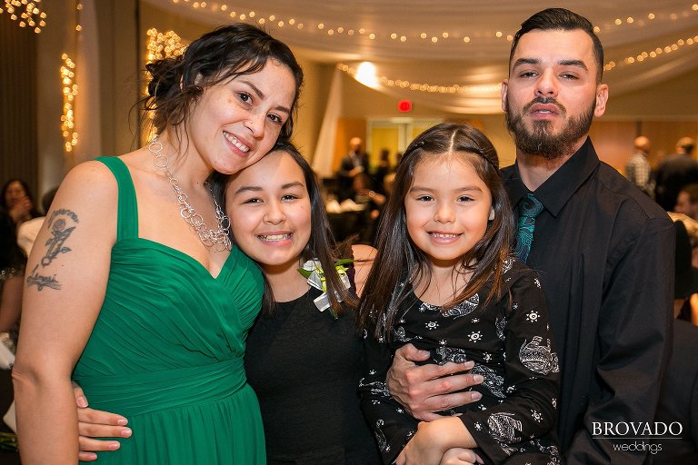 Wedding guests smiling together