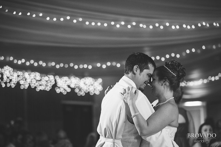 Bride and groom smiling during first dance