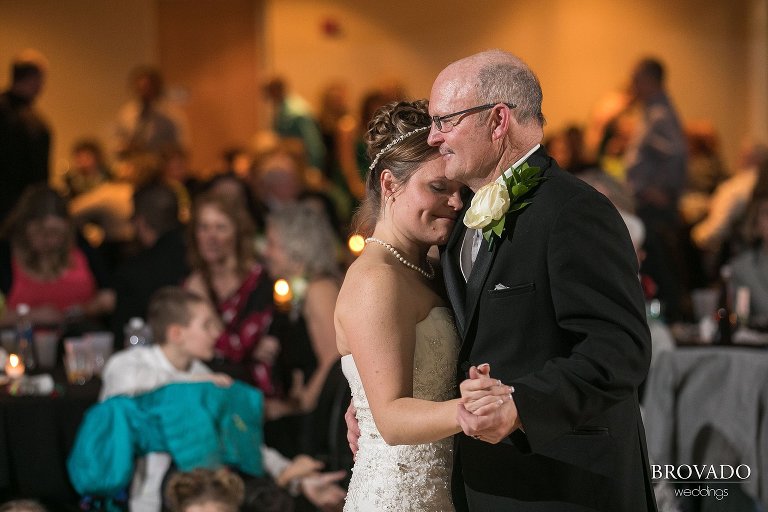 Bride and her father dancing together