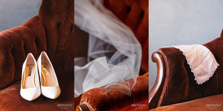 White bridal details against velvet and leather armchair
