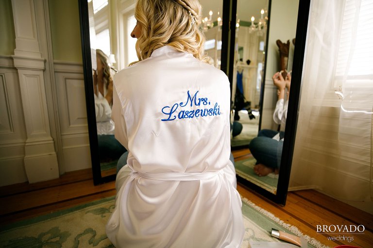 Brooke wearing a robe embroidered with her new last name