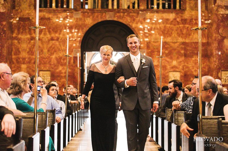 Aaron walking family down the aisle