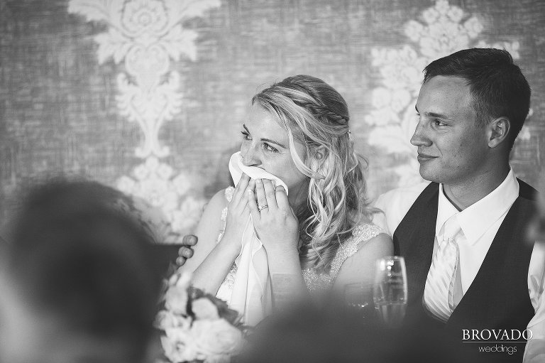 Brooke crying into napkin during her father's speech