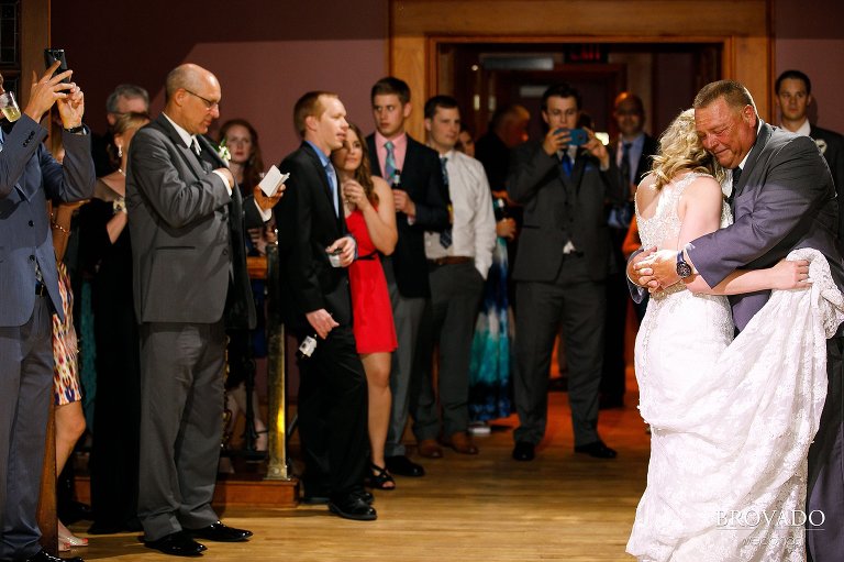 Brooke and her father dancing together