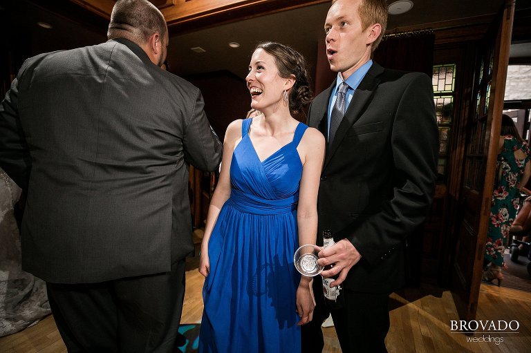 Wedding guests dancing and laughing