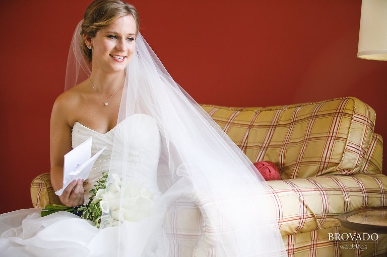 Annie reading a handwritten note from her fiance